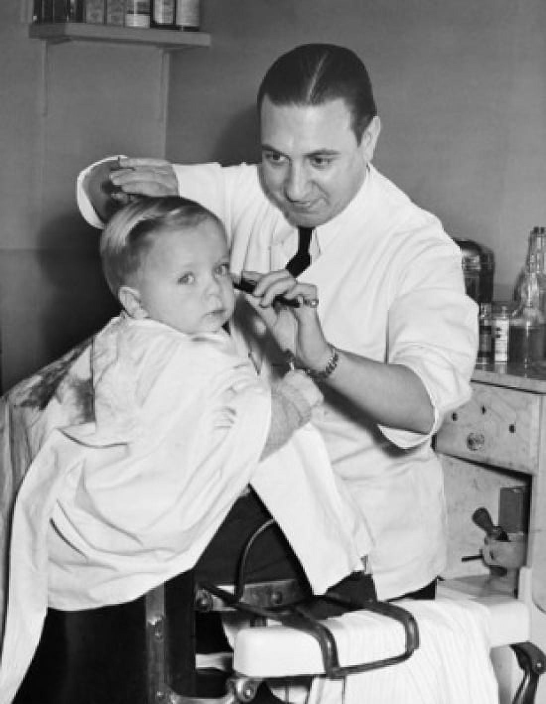 Portrait of a boy getting a haircut from a barber Canvas Art -  (24 x 36)