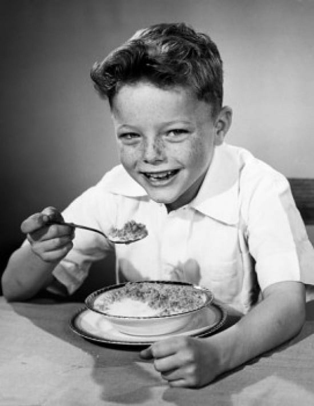 Portrait of a boy having breakfast Canvas Art - (18 x 24)