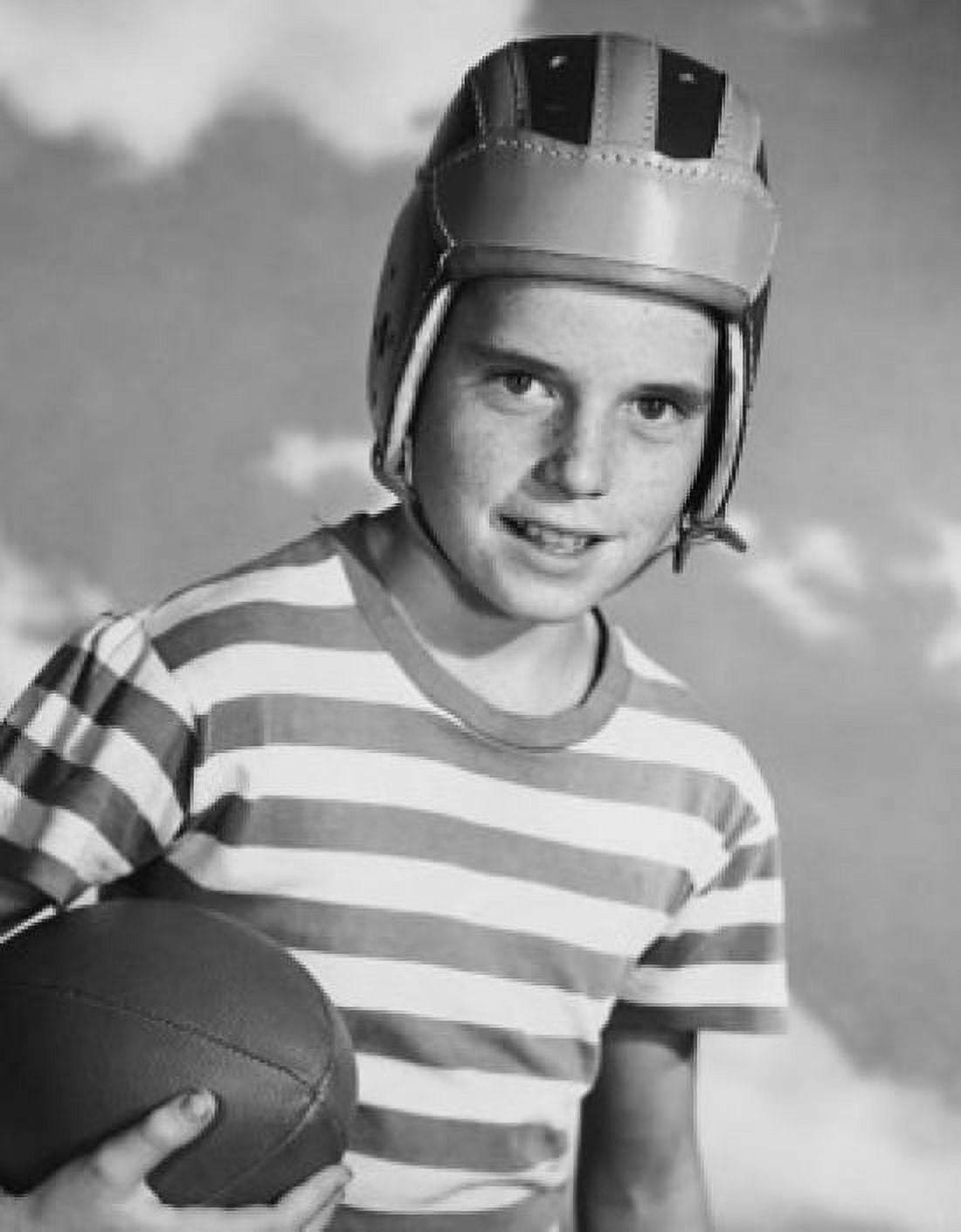 Portrait of a boy holding a football Canvas Art - (18 x 24)