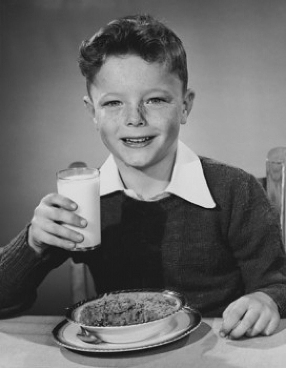 Portrait of a boy holding a glass of milk Canvas Art - (24 x 36)