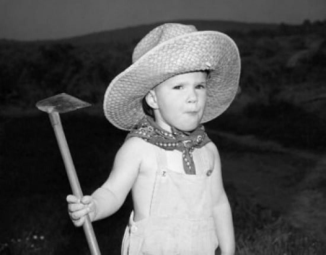 Portrait of a boy holding a hoe Canvas Art - (18 x 24)