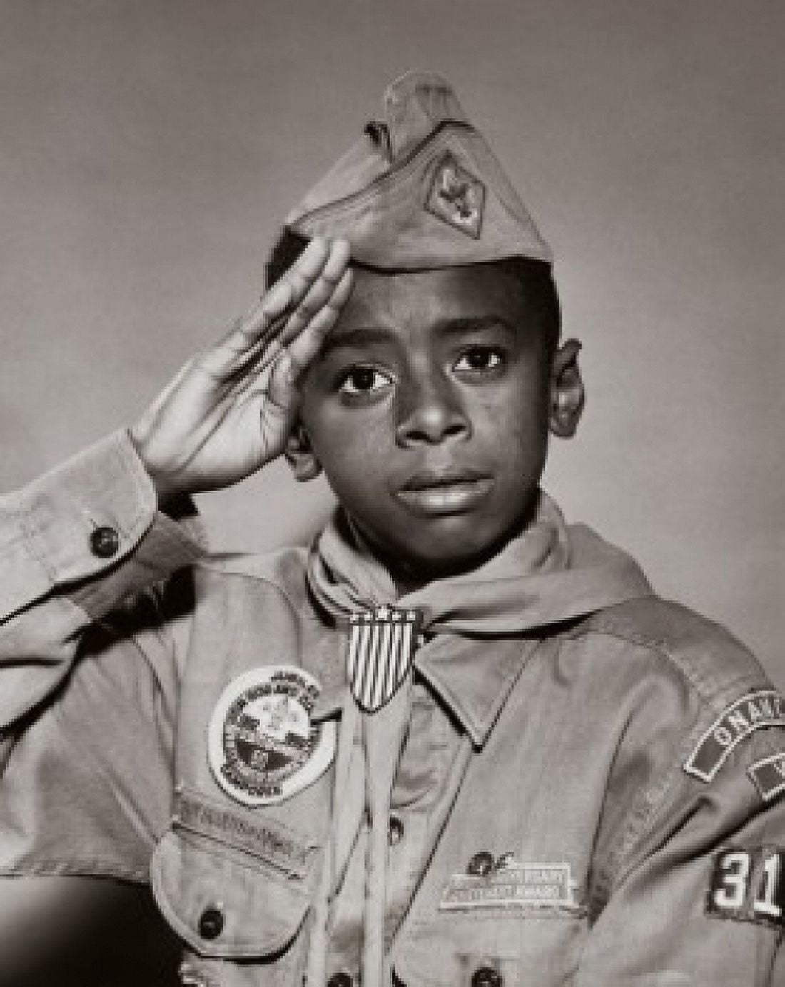 Portrait of a boy scout saluting Canvas Art - (24 x 36)