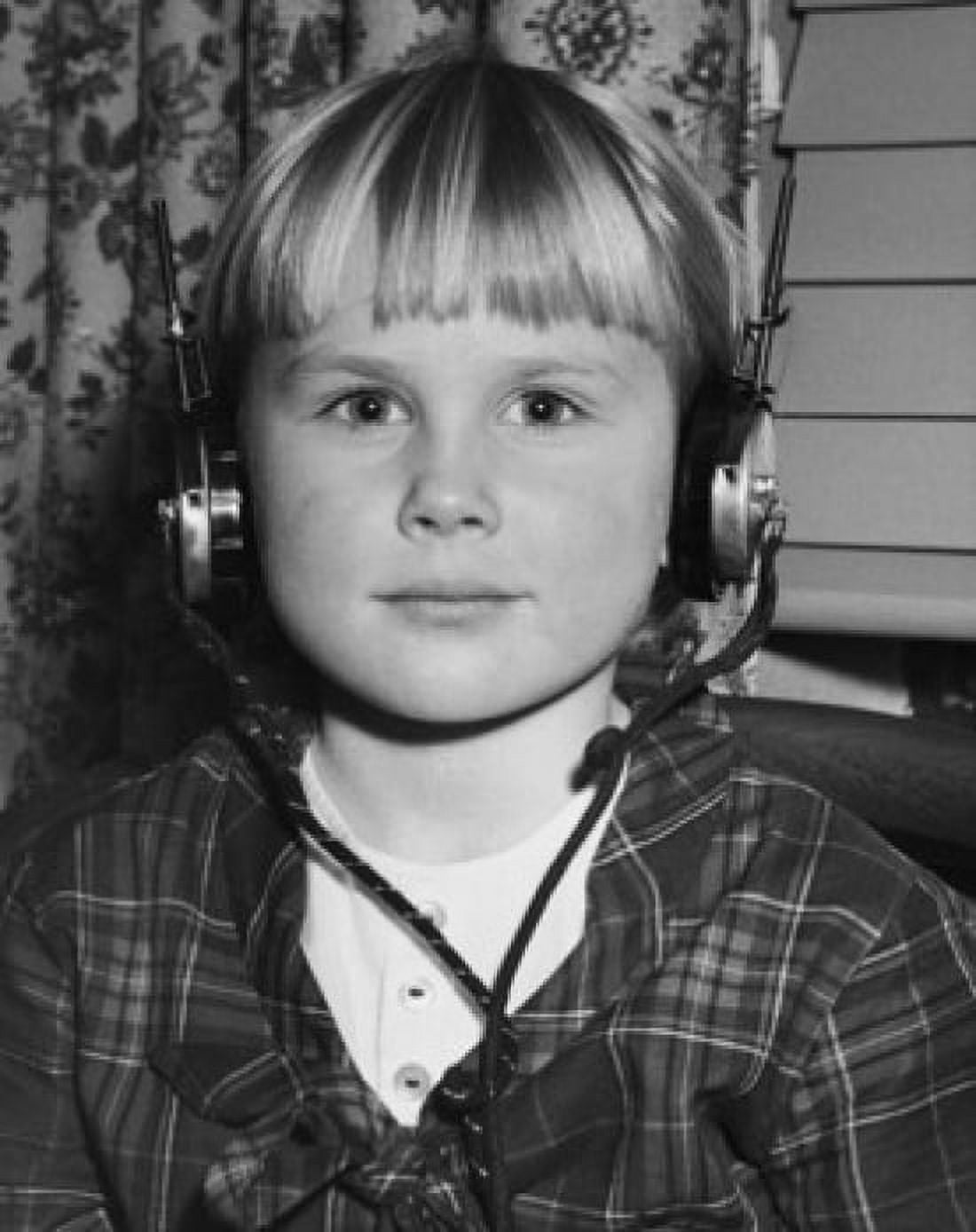 Portrait of a boy wearing headphones Canvas Art - (18 x 24)