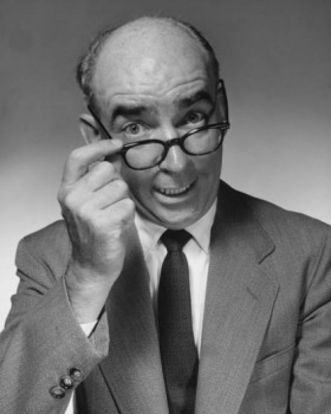 Portrait of a businessman adjusting his eyeglasses Canvas Art - (24 x 36)