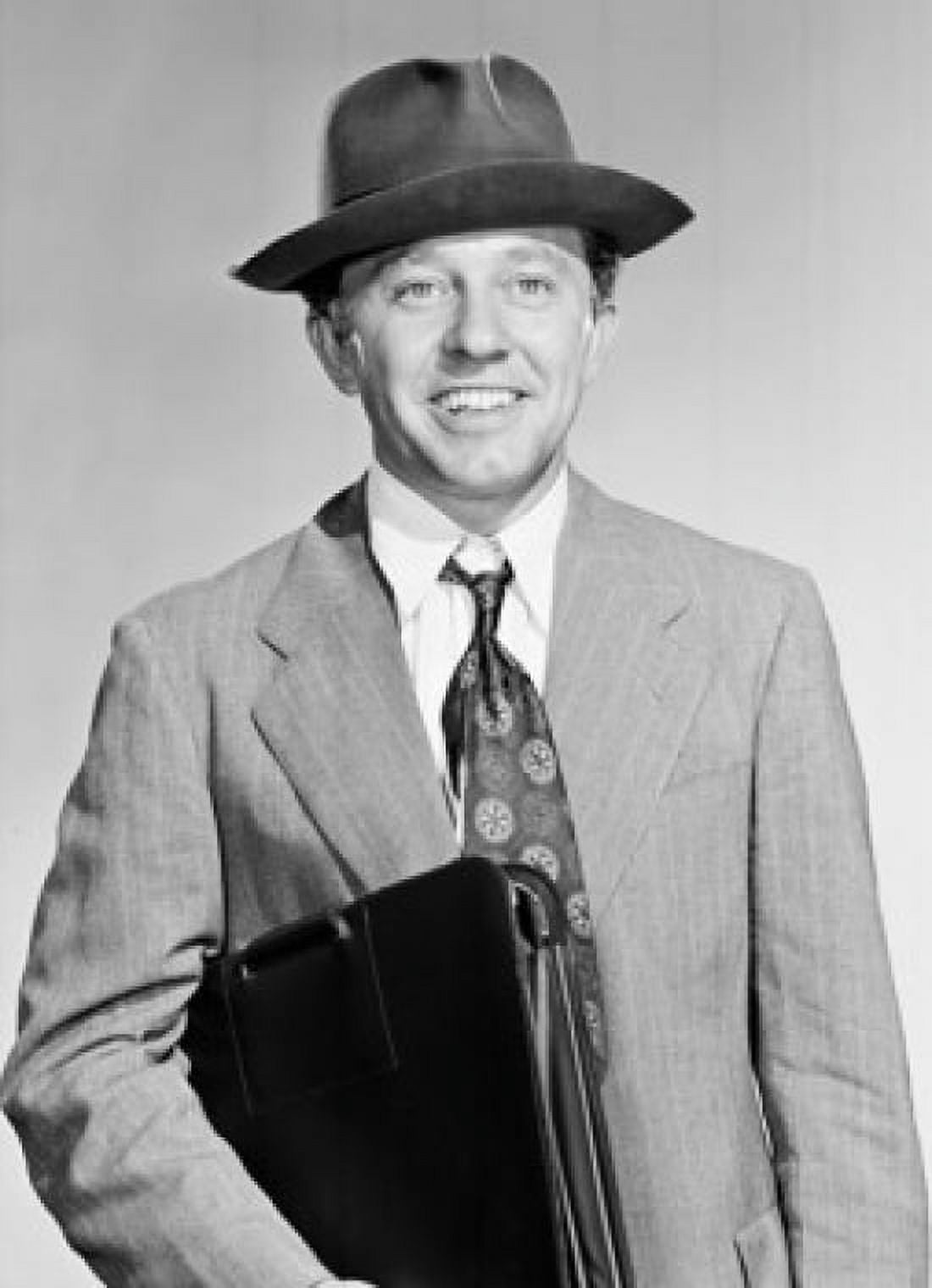 Portrait of a businessman holding a briefcase Canvas Art - (24 x 36)