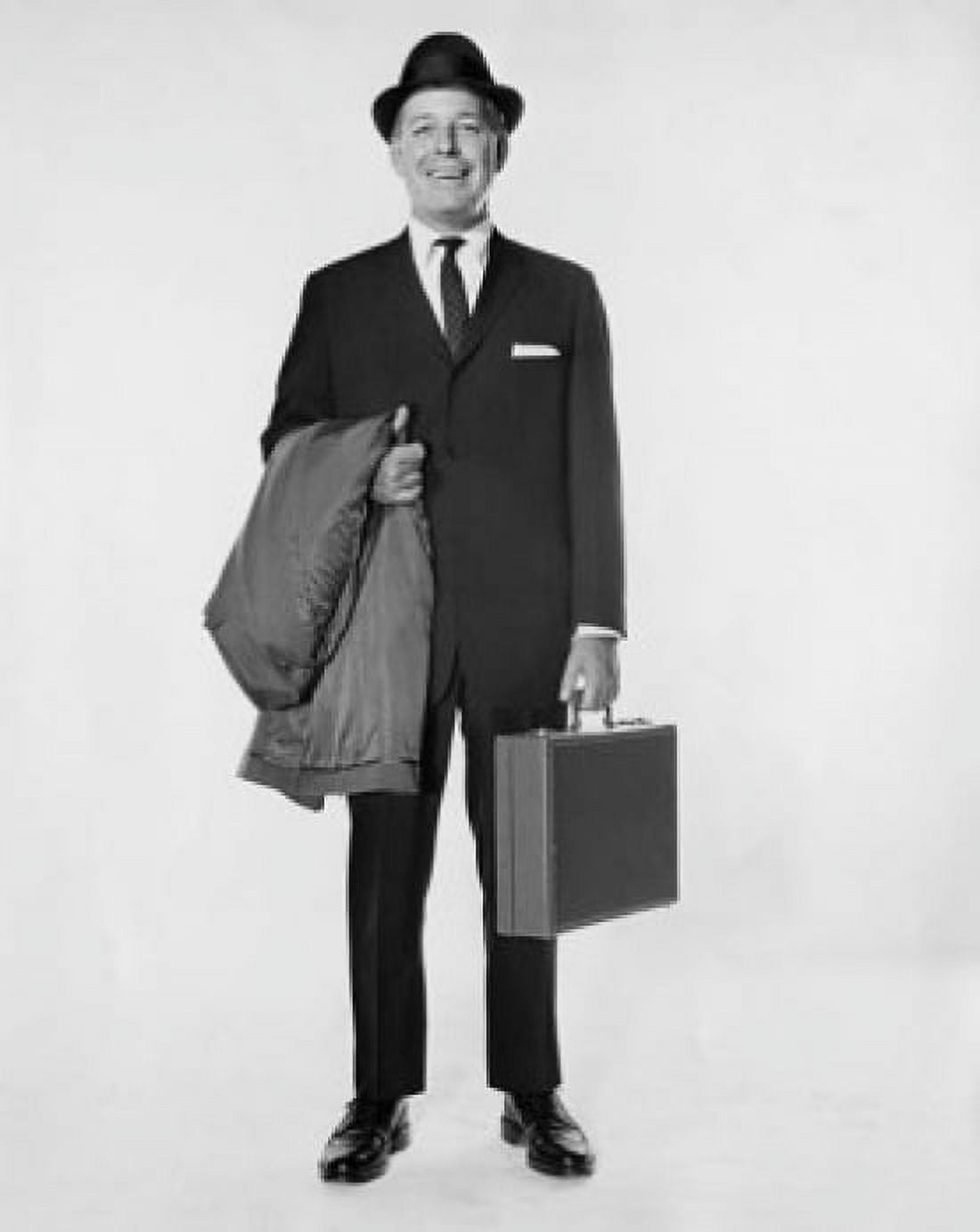 Portrait of a businessman holding a briefcase and an overcoat Canvas Art - (18 x 24)