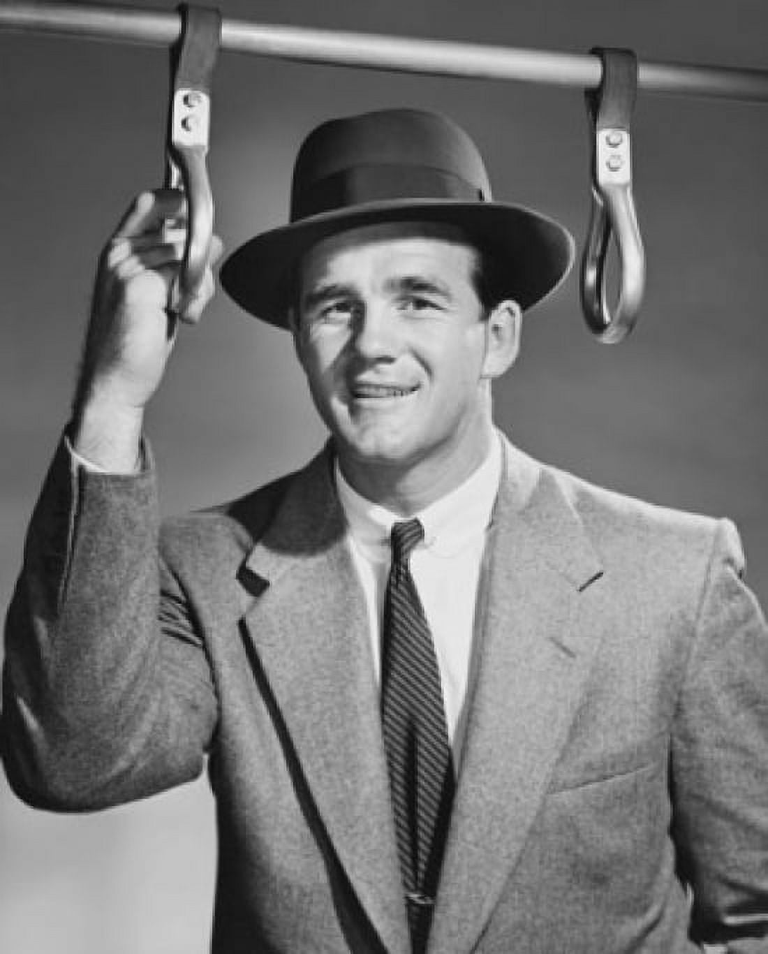 Portrait of a businessman holding a handle strap in a bus Canvas Art - (18 x 24)