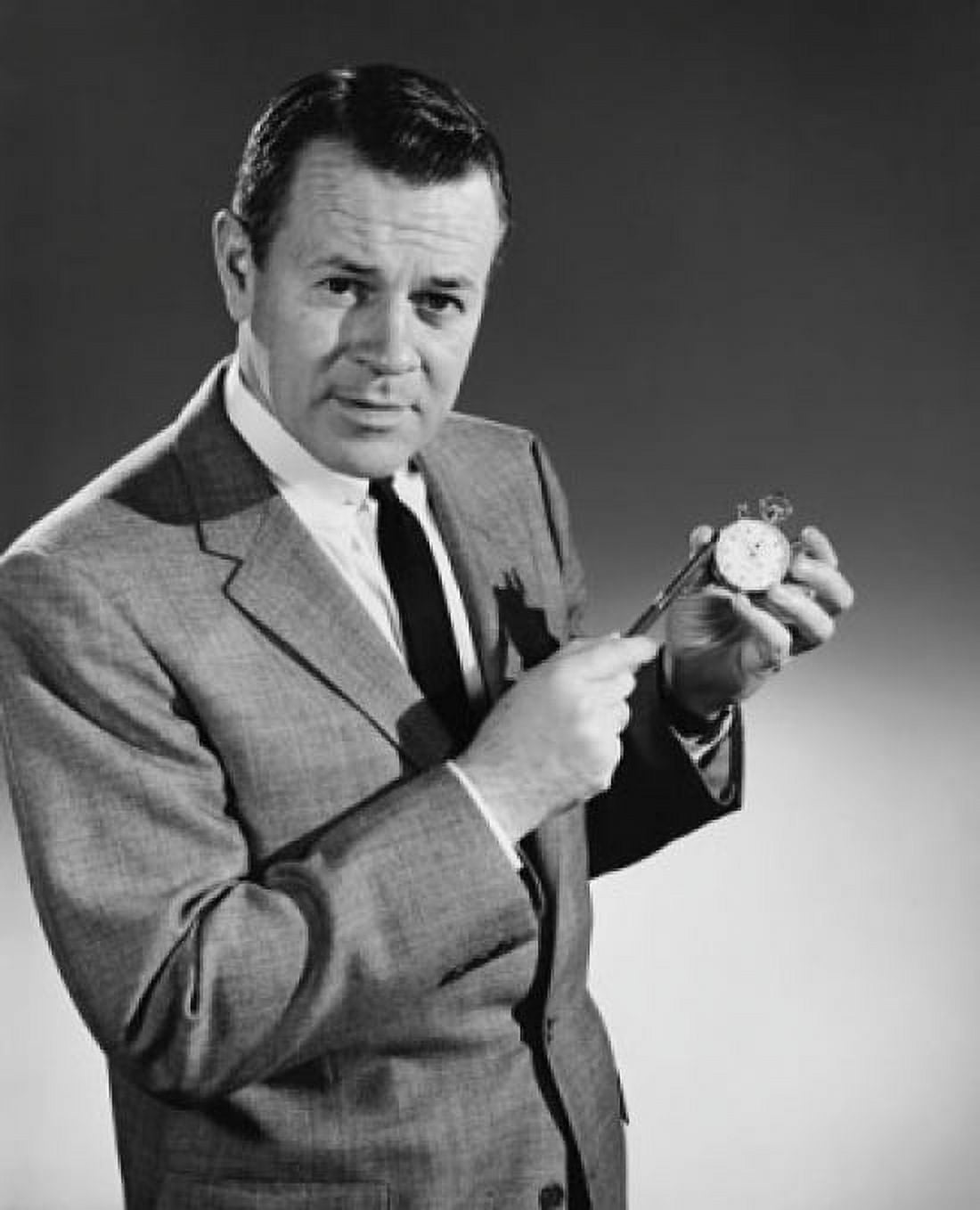 Portrait of a businessman holding a pen and a stopwatch Canvas Art - (18 x 24)