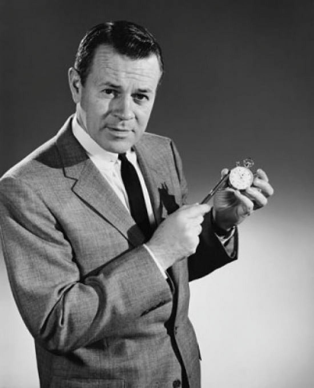 Portrait of a businessman holding a pen and a stopwatch Canvas Art - (24 x 36)