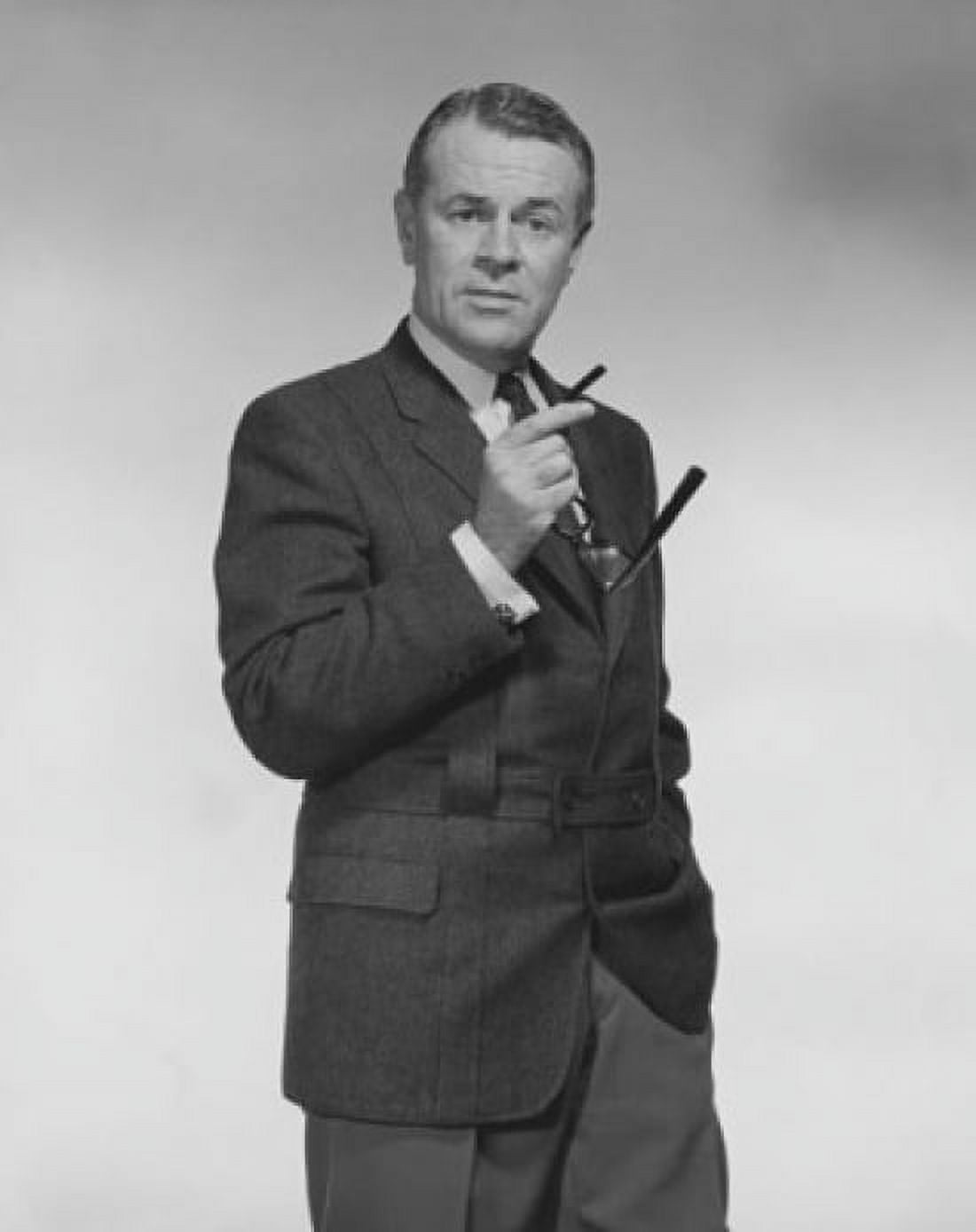 Portrait of a businessman holding his eyeglasses Canvas Art - (24 x 36)