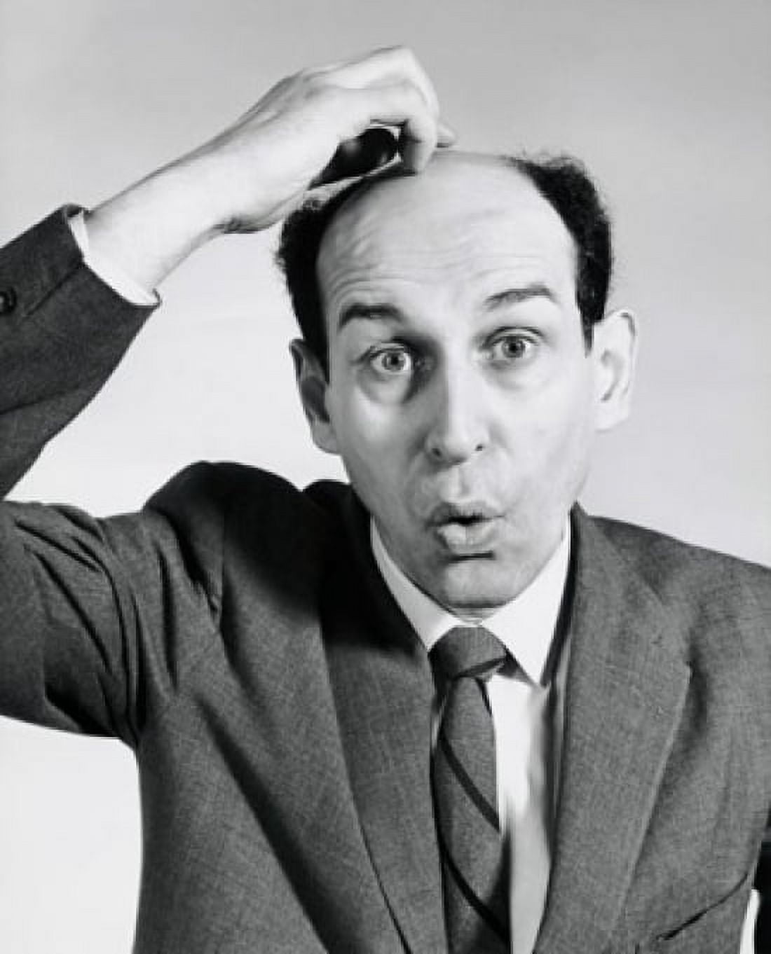 Portrait of a businessman looking confused Canvas Art - (24 x 36)
