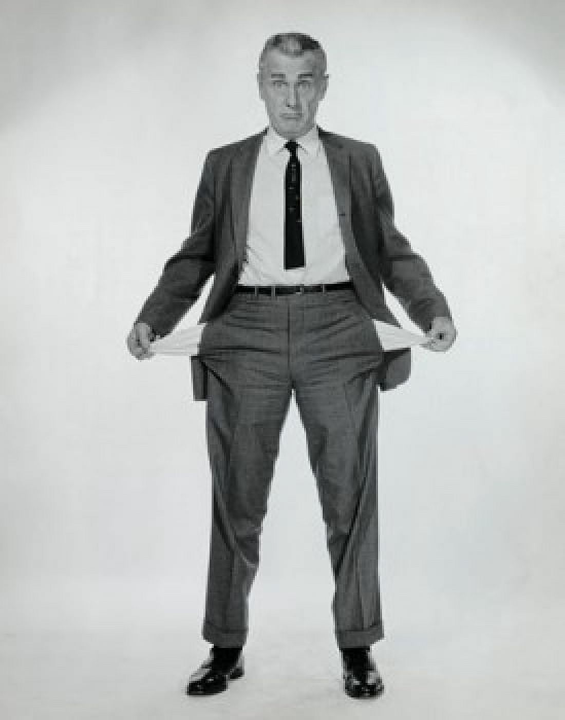 Portrait of a businessman showing his empty pockets Canvas Art - (18 x 24)