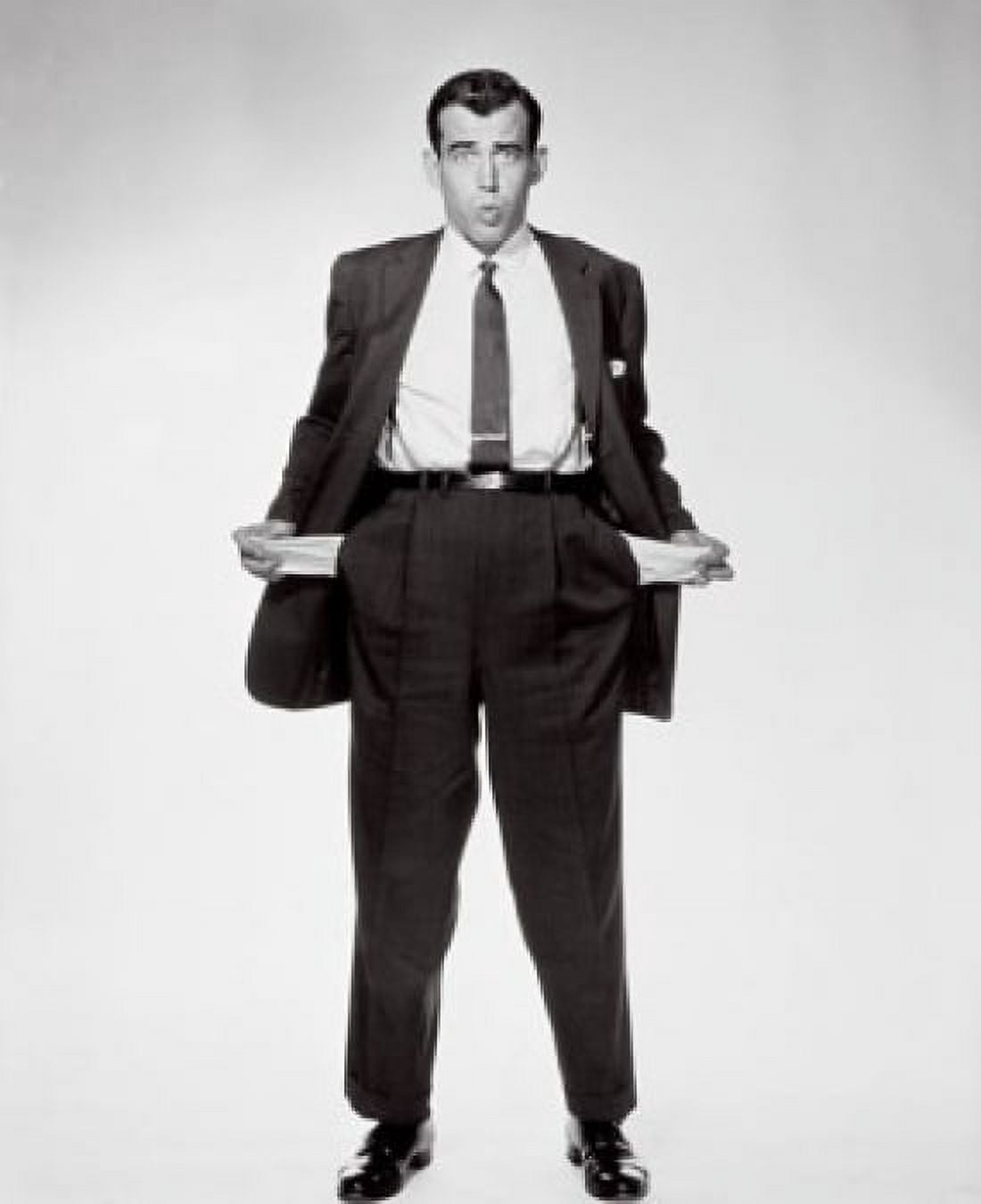 Portrait of a businessman showing his empty pockets Canvas Art - (18 x 24)