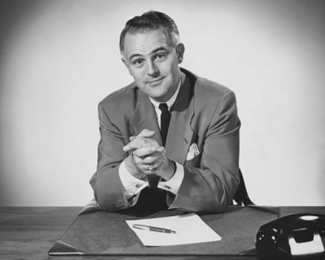 Portrait of a businessman sitting in an office Canvas Art - (18 x 24)