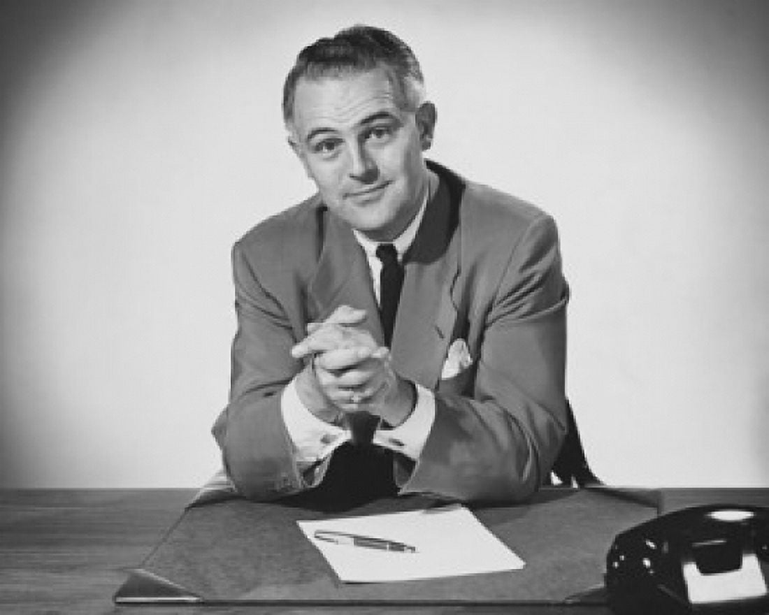 Portrait of a businessman sitting in an office Canvas Art - (24 x 36)