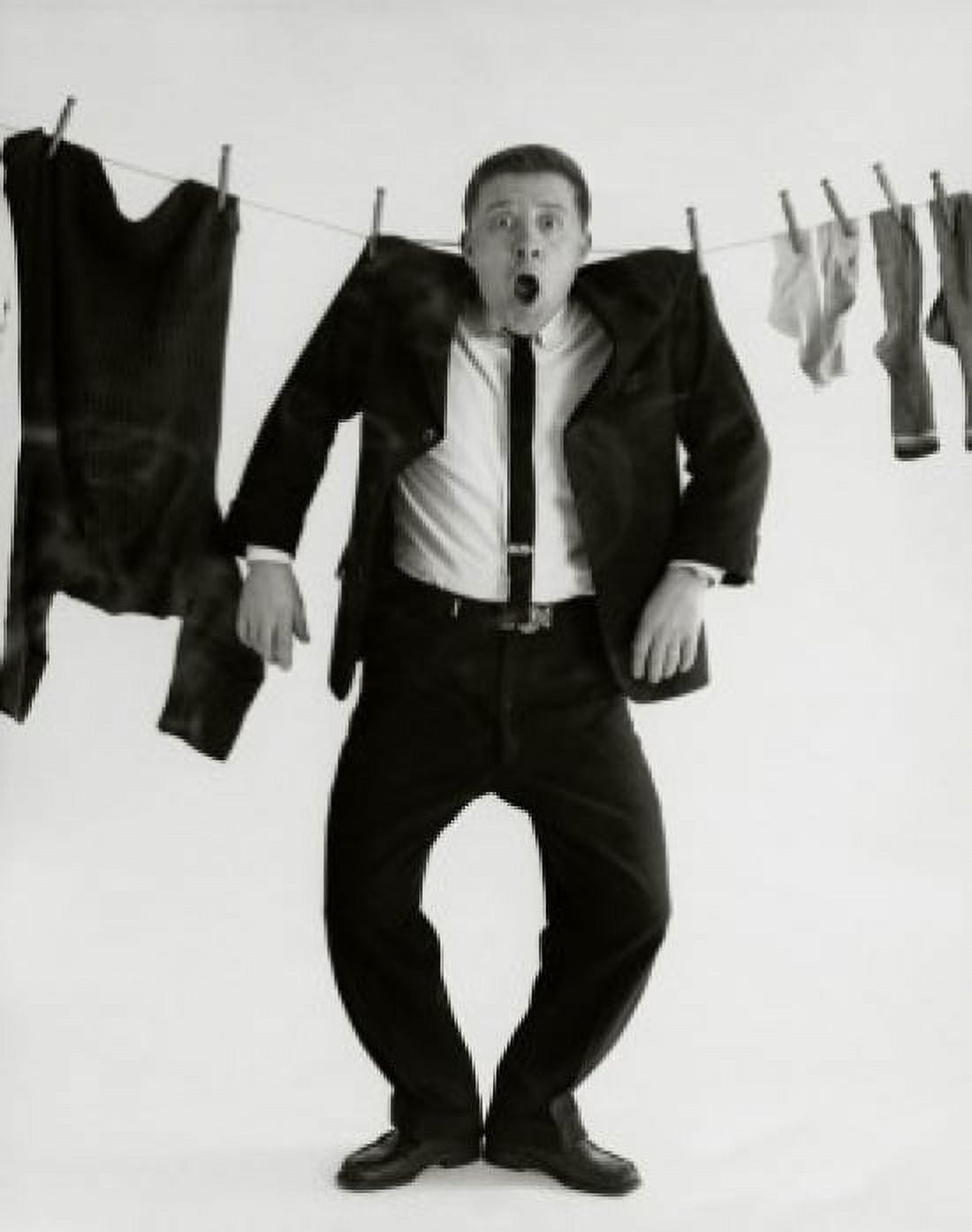 Portrait of a businessman strung up on a clothesline Canvas Art - (18 x 24)