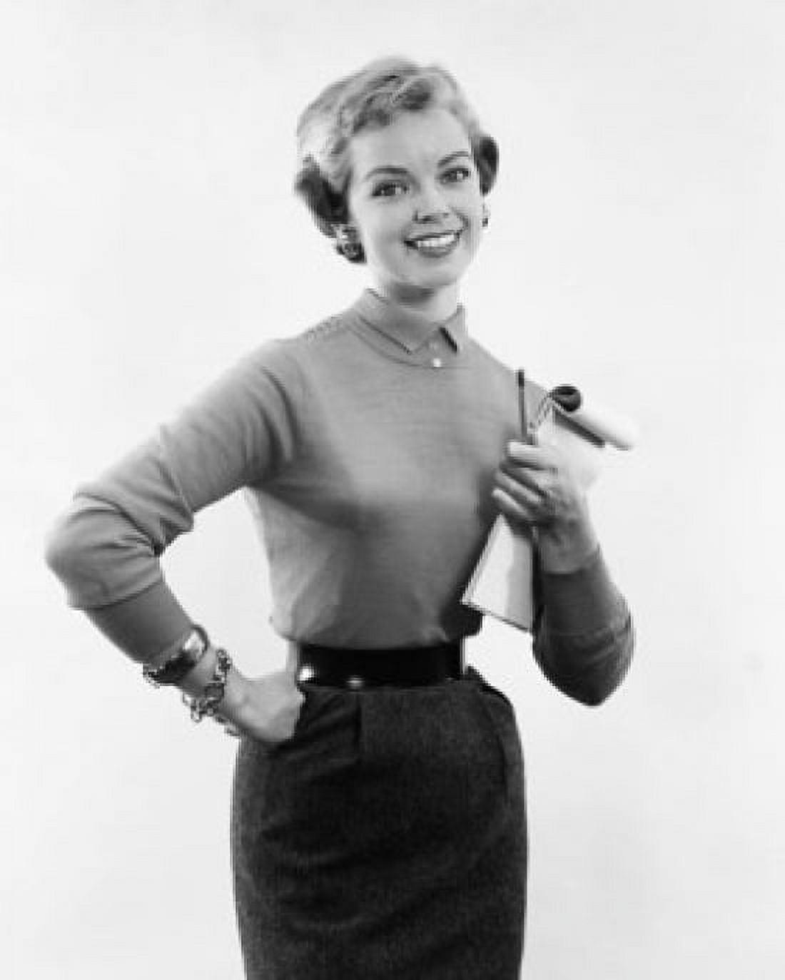 Portrait of a businesswoman holding a notepad and smiling Canvas Art - (18 x 24)