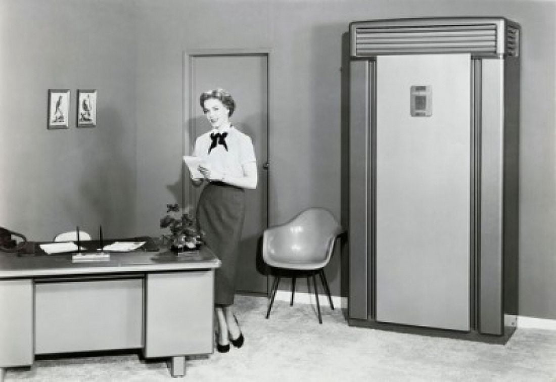 Portrait of a businesswoman holding a notepad in an office Canvas Art - (18 x 24)