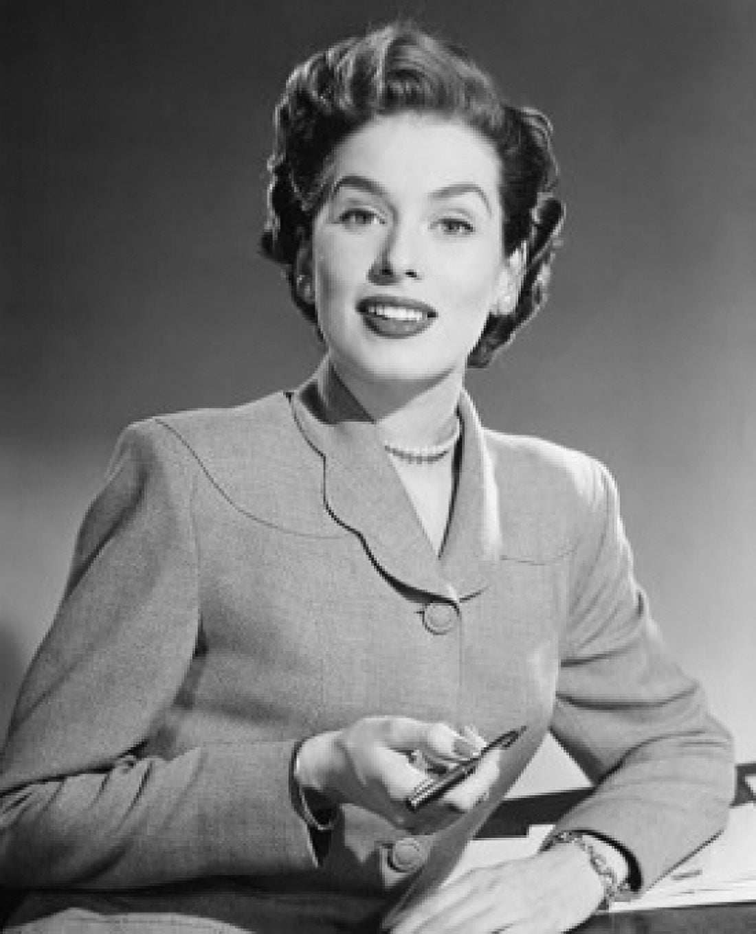 Portrait of a businesswoman holding a pen Canvas Art - (18 x 24)