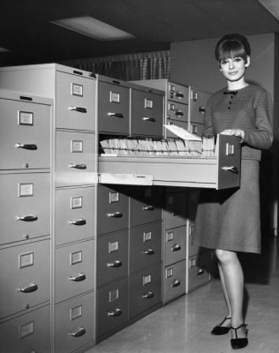 Portrait of a businesswoman standing beside a filing cabinet Canvas Art - (18 x 24)