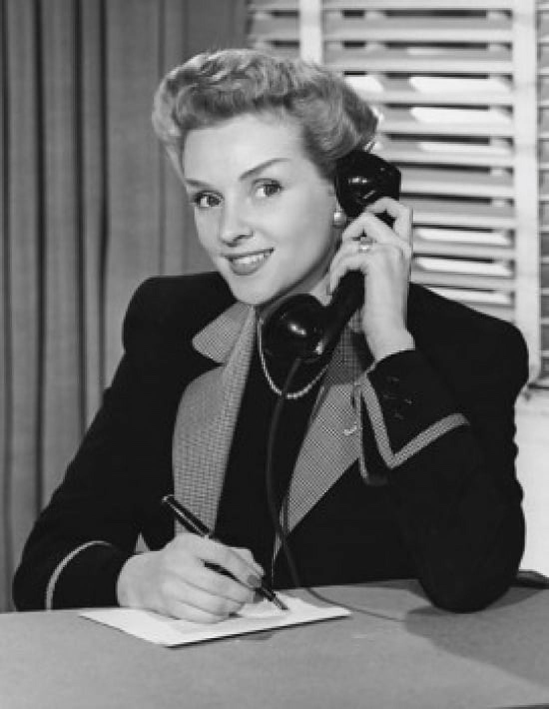 Portrait of a businesswoman talking on the telephone in an office Canvas Art - (24 x 36)