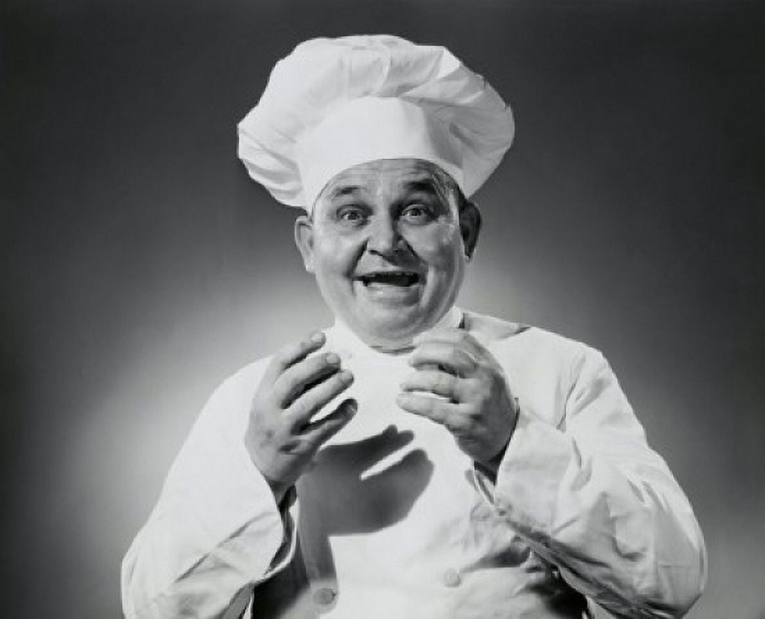 Portrait of a chef laughing Canvas Art - (24 x 36)