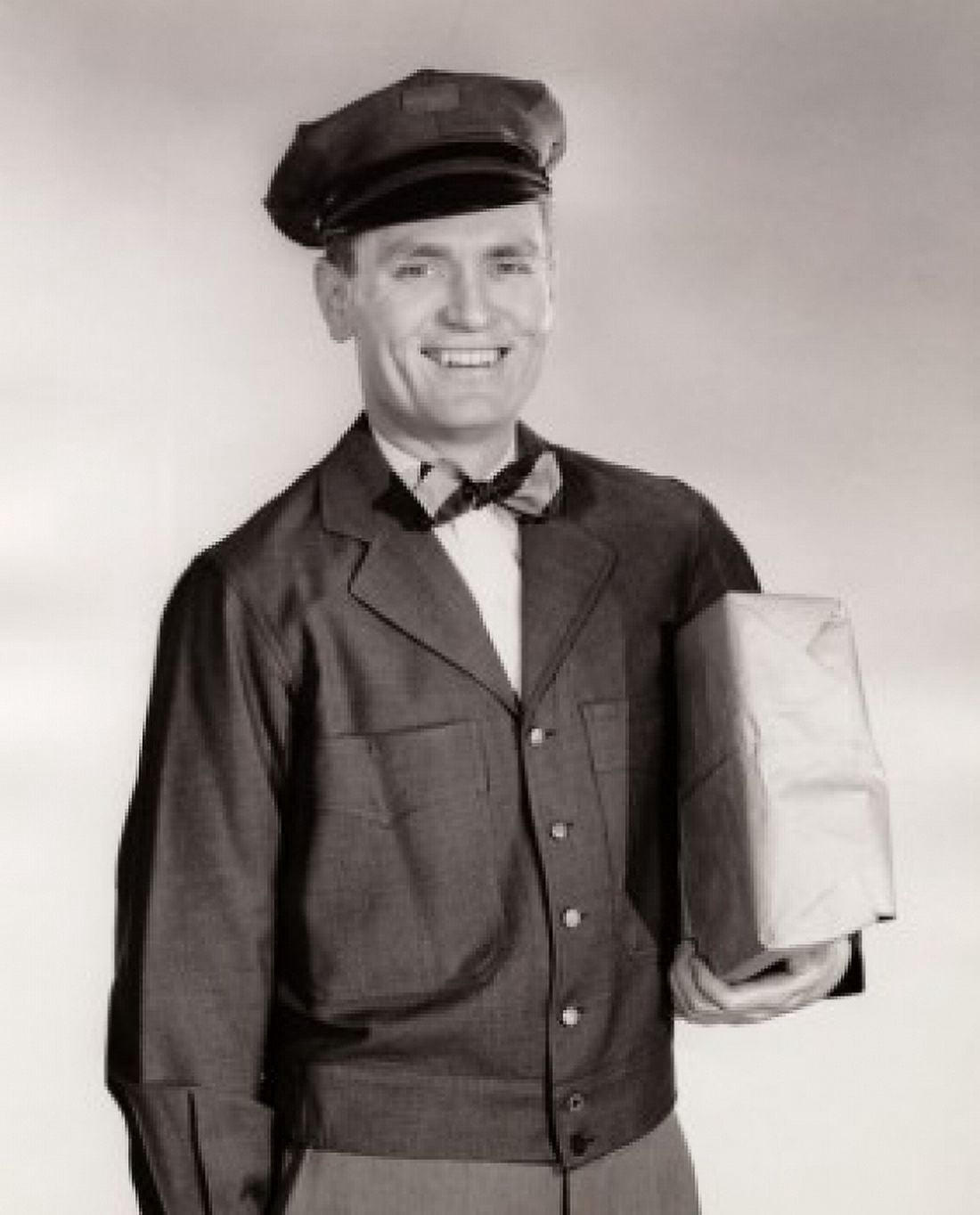 Portrait of a delivery person delivering a package Canvas Art - (24 x 36)