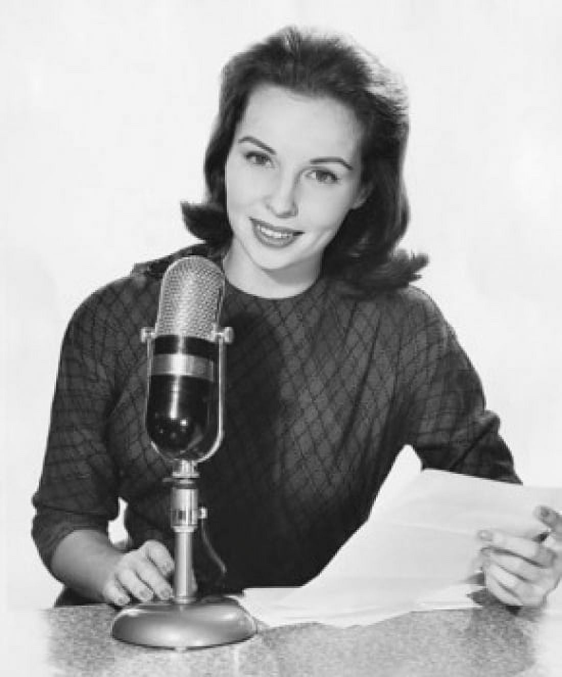 Portrait of a female newscaster speaking in to a microphone Canvas Art - (18 x 24)
