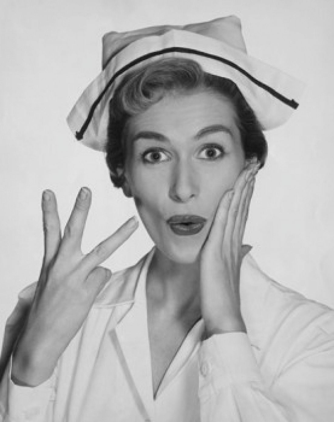 Portrait of a female nurse gesturing and looking surprised Canvas Art - (18 x 24)