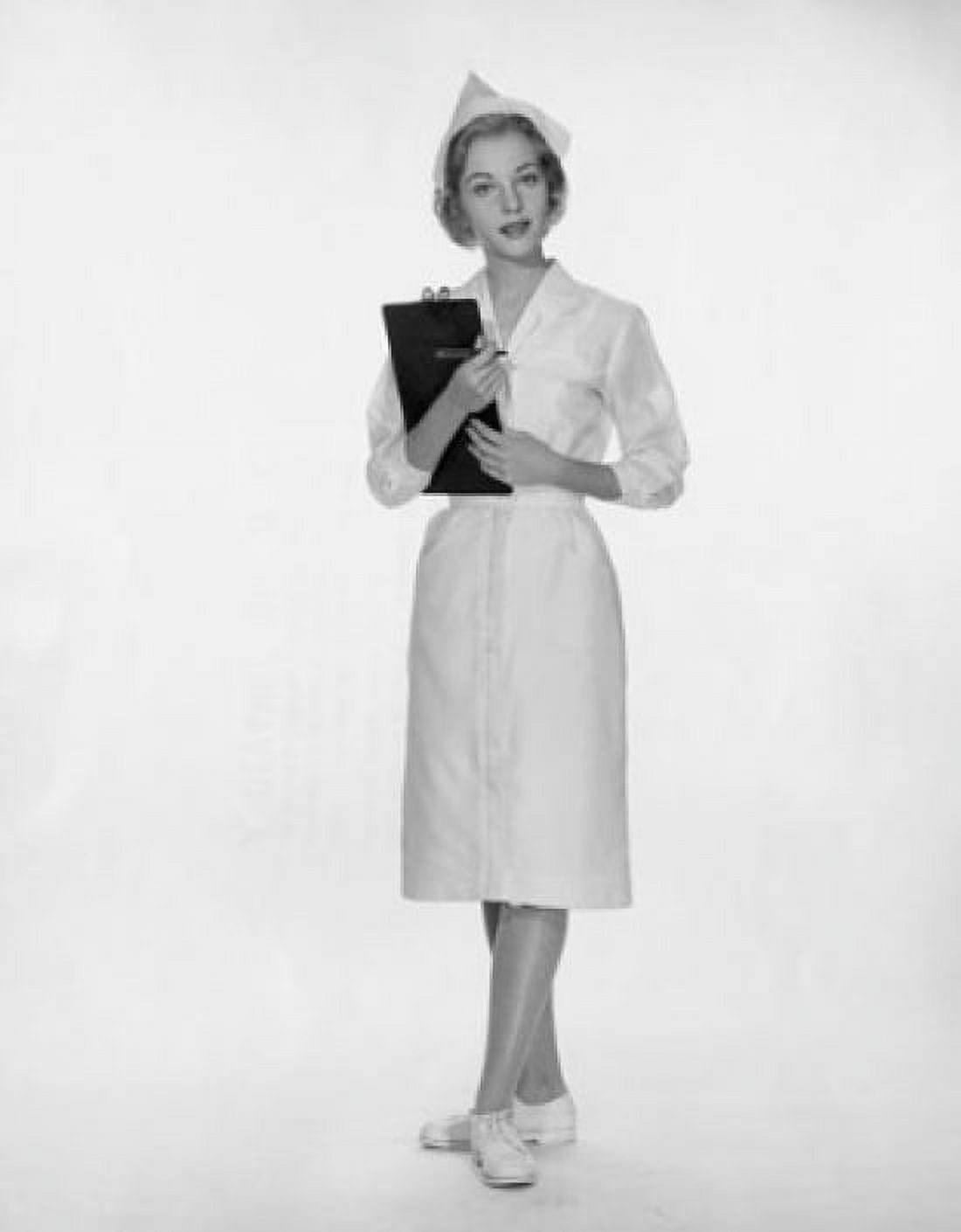 Portrait of a female nurse holding a clipboard Canvas Art - (18 x 24)
