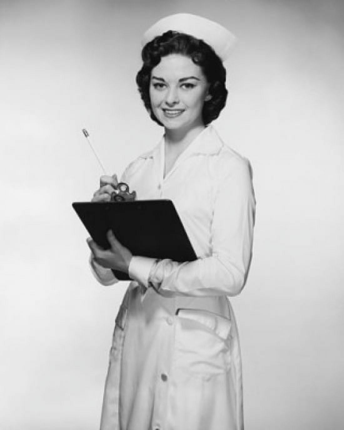 Portrait of a female nurse holding a clipboard Canvas Art -  (18 x 24)