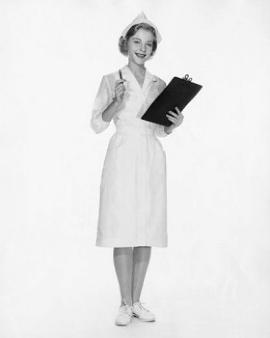 Portrait of a female nurse holding a clipboard and smiling Canvas Art - (24 x 36)