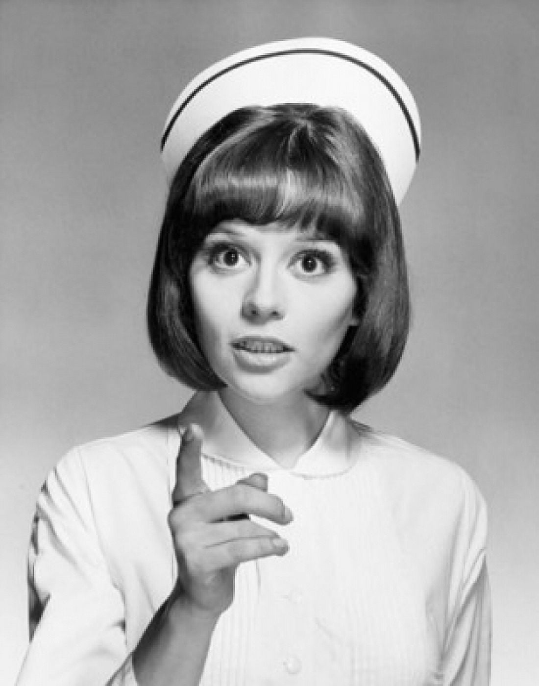 Portrait of a female nurse pointing with her finger Canvas Art - (24 x 36)