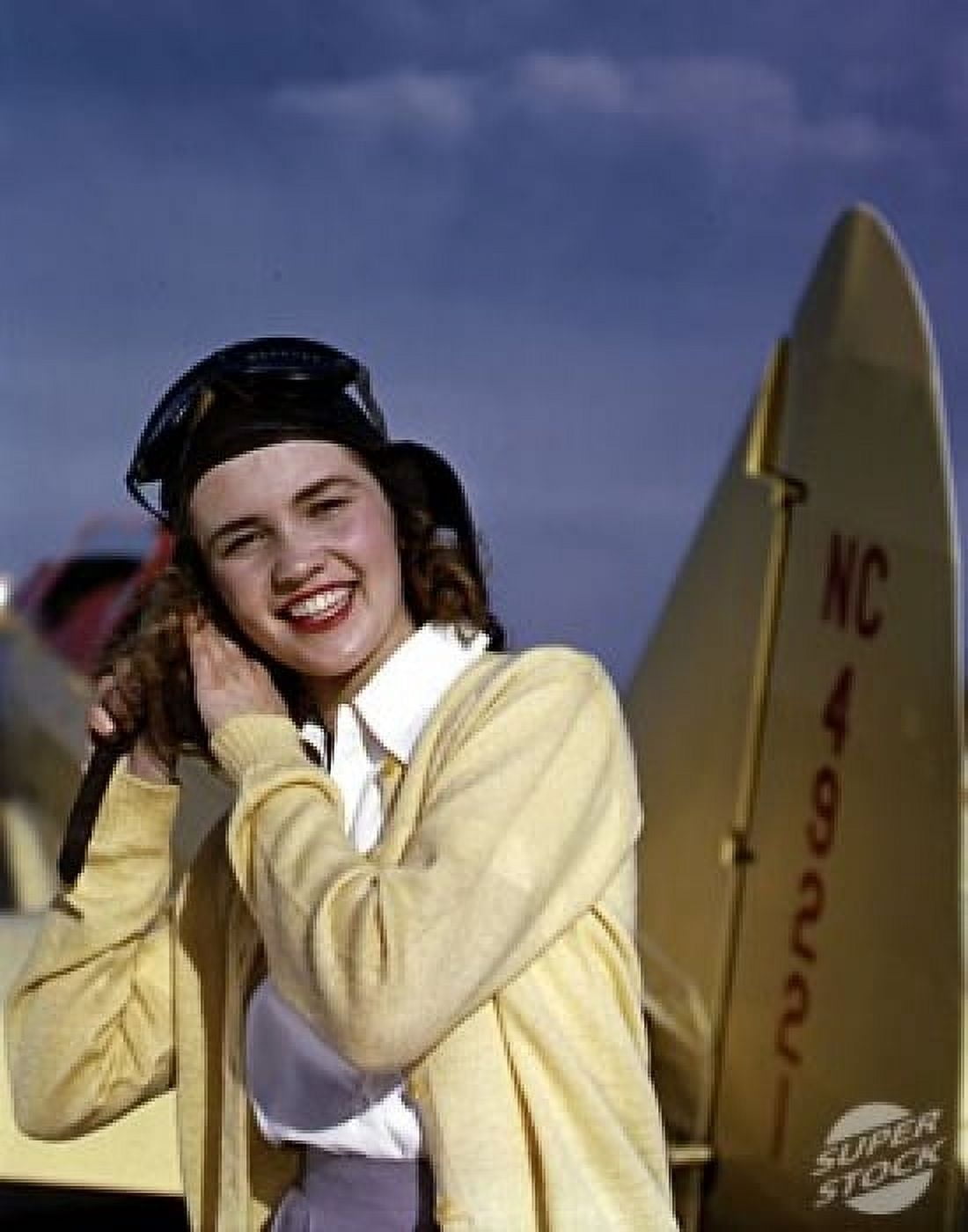 Portrait of a female pilot smiling Canvas Art - (24 x 36)