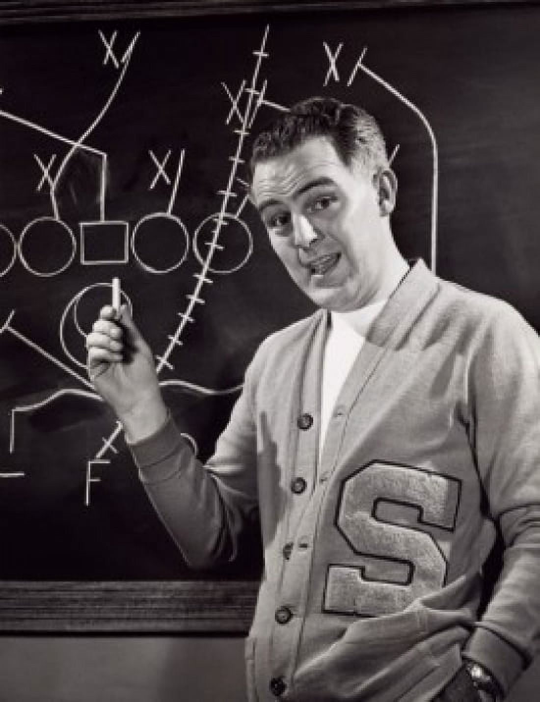 Portrait of a football coach explaining game play on the blackboard Canvas Art - (18 x 24)