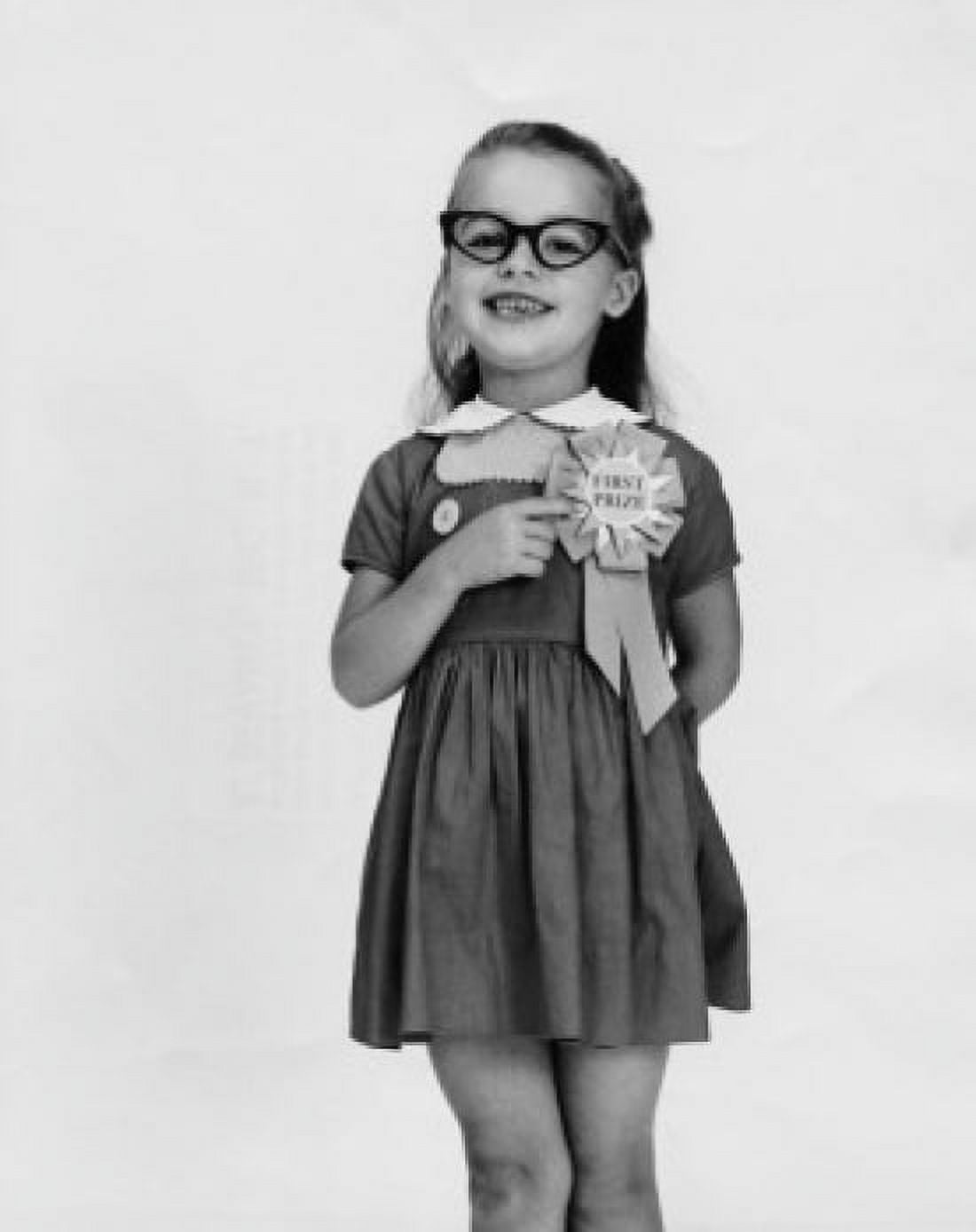 Portrait of a girl pointing to her first place ribbon Canvas Art - (18 x 24)