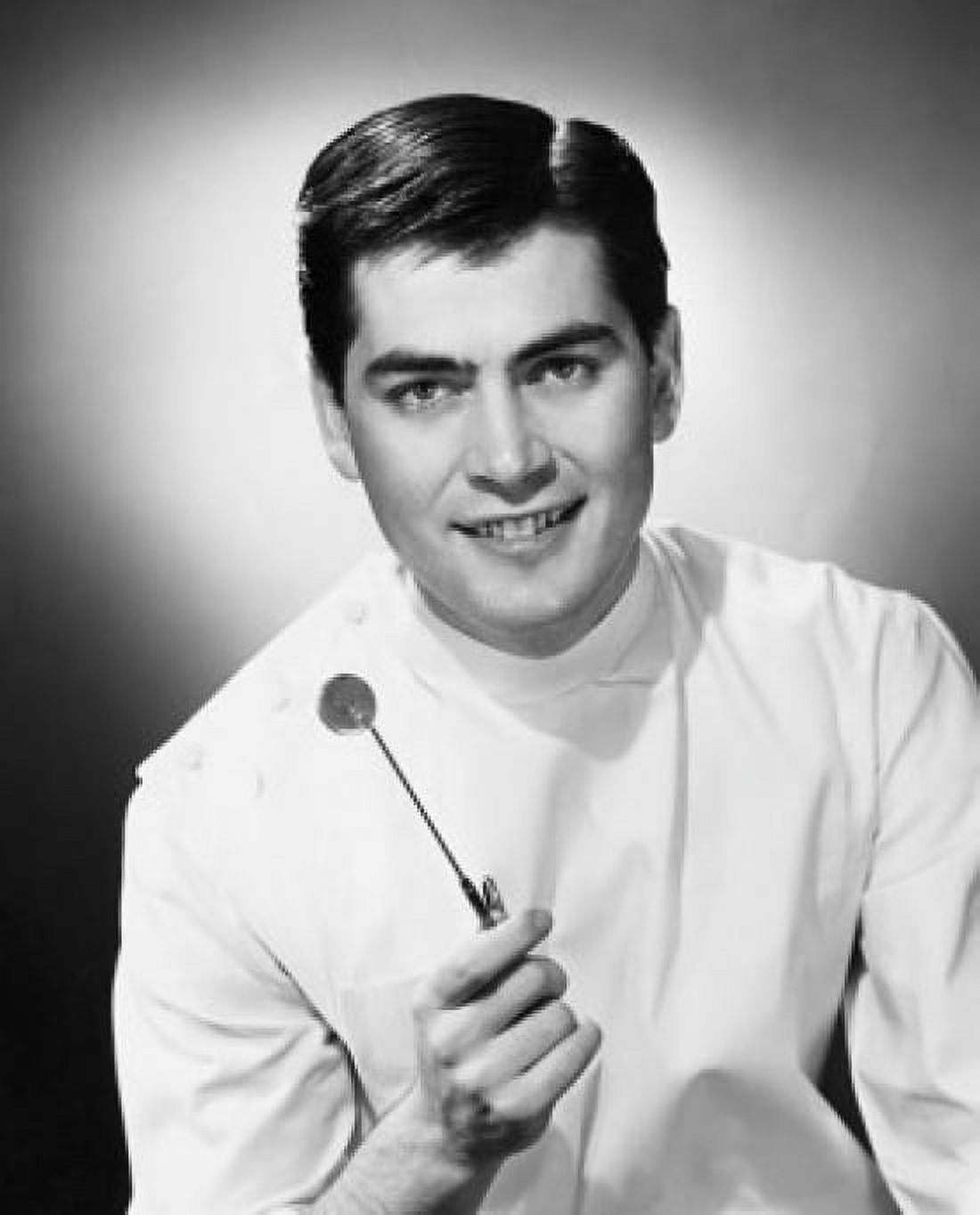 Portrait of a male dentist holding an angled mirror and smiling Canvas Art - (18 x 24)