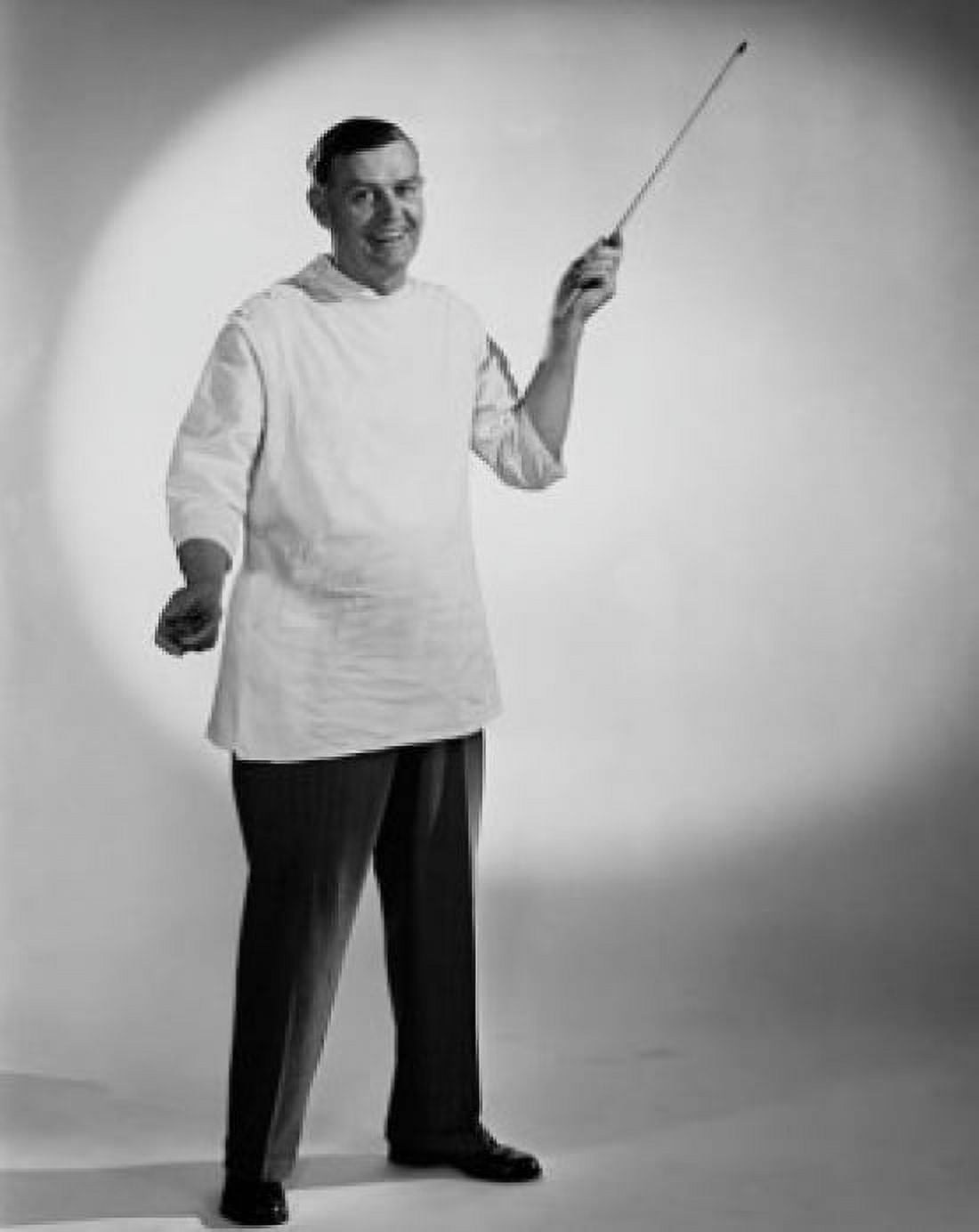 Portrait of a male doctor holding a pointer stick and smiling Canvas Art - (18 x 24)