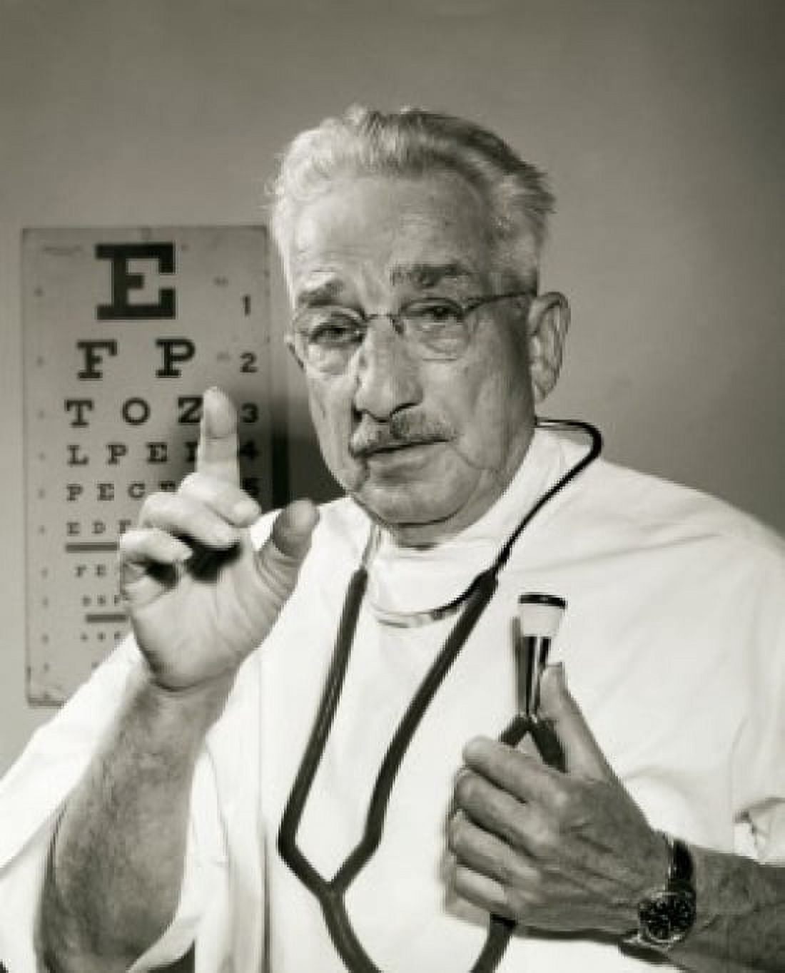 Portrait of a male doctor holding a stethoscope Canvas Art - (18 x 24)