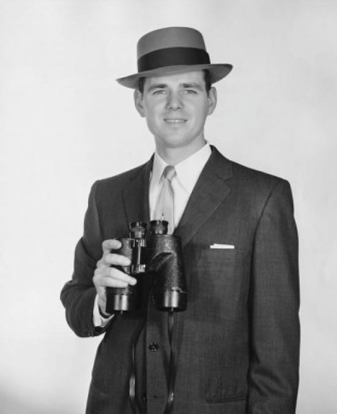 Portrait of a man holding binoculars Canvas Art - (18 x 24)
