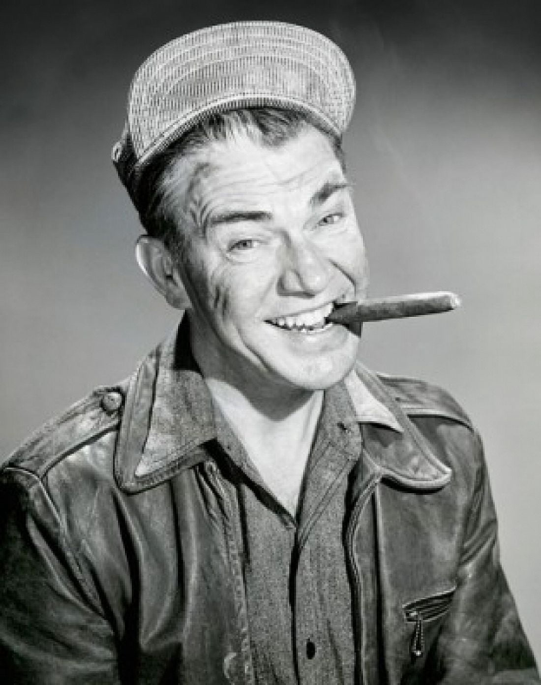 Portrait of a manual worker holding a cigar in his mouth and smiling 1953 Canvas Art - (18 x 24)