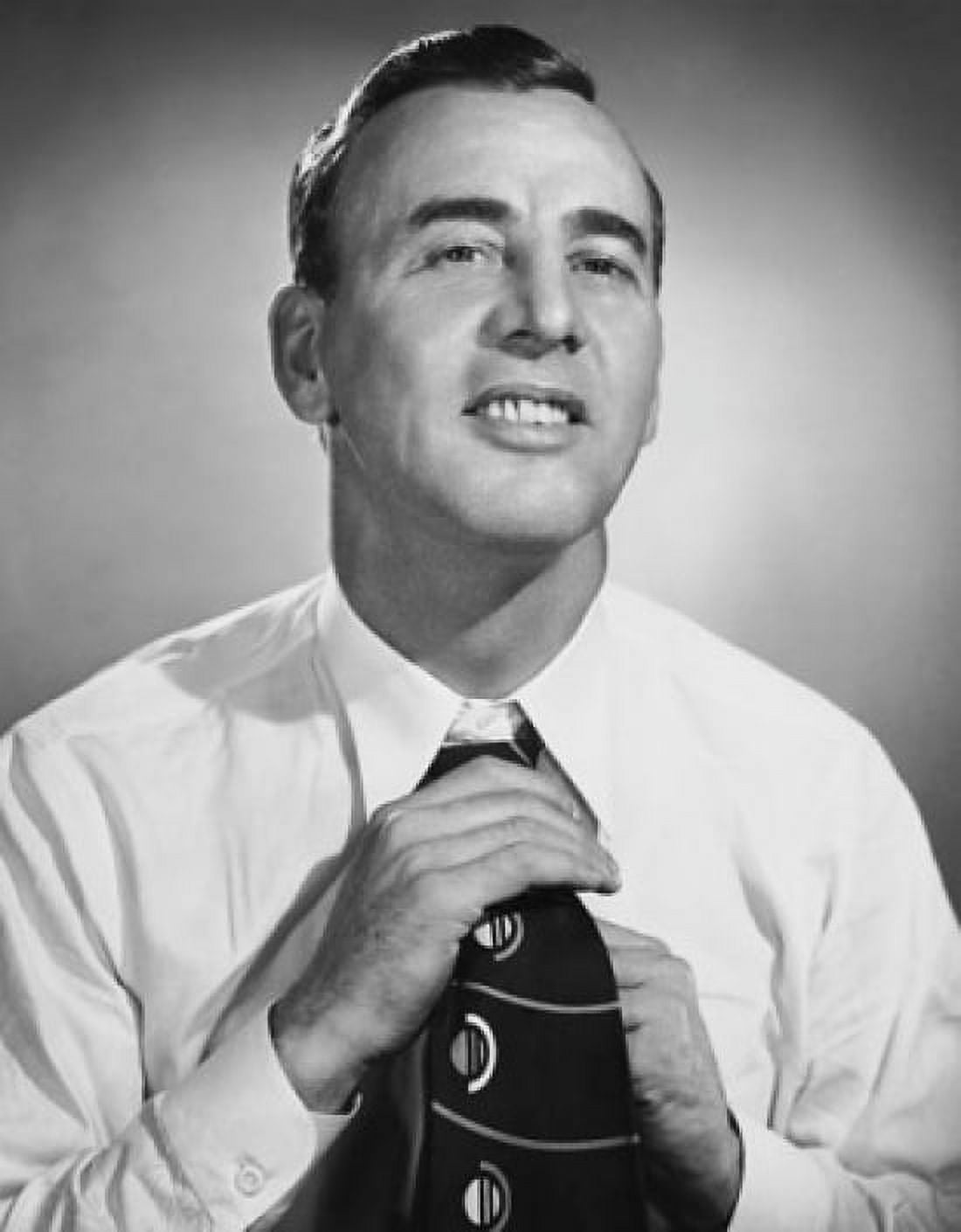 Portrait of a mature man adjusting his tie Canvas Art - (24 x 36)