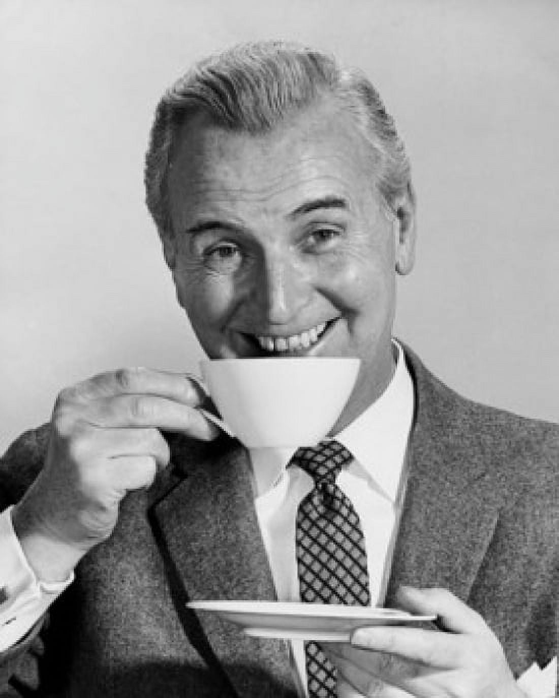 Portrait of a mature man drinking from a coffee cup Canvas Art - (24 x 36)