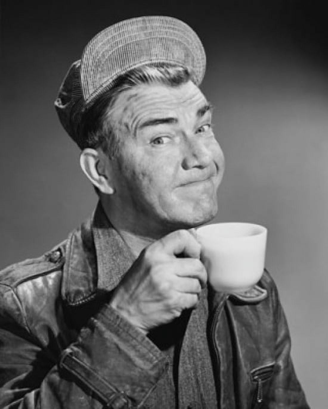 Portrait of a mature man drinking from a tea cup Canvas Art - (18 x 24)