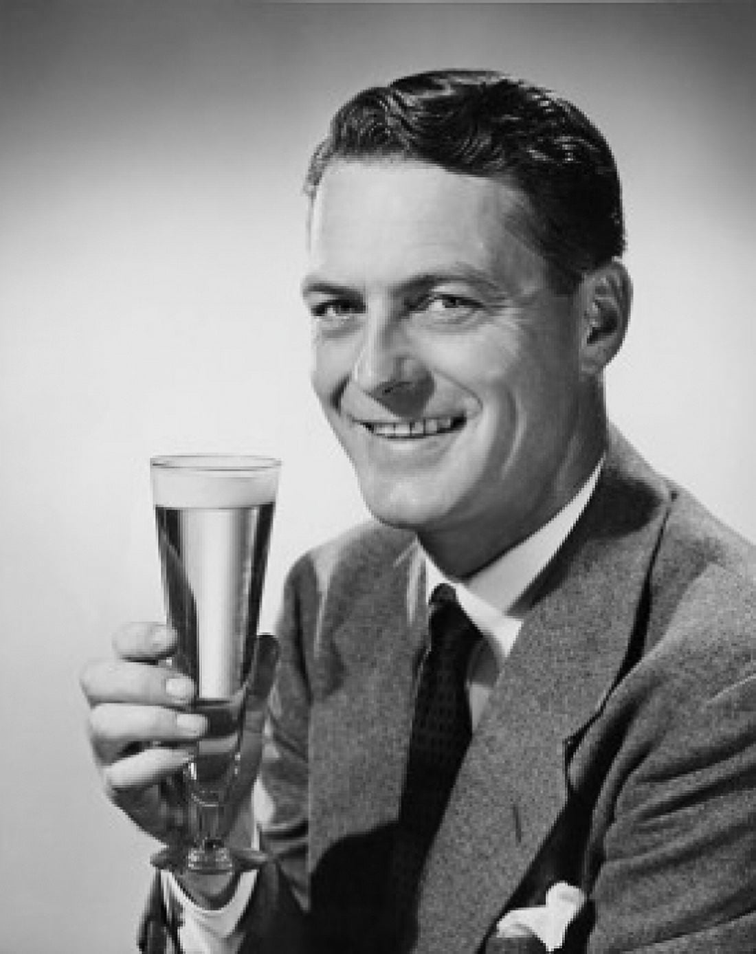 Portrait of a mature man holding a glass of beer Canvas Art - (18 x 24)