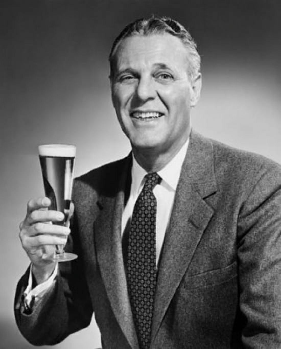 Portrait of a mature man holding a glass of beer Canvas Art - (18 x 24)
