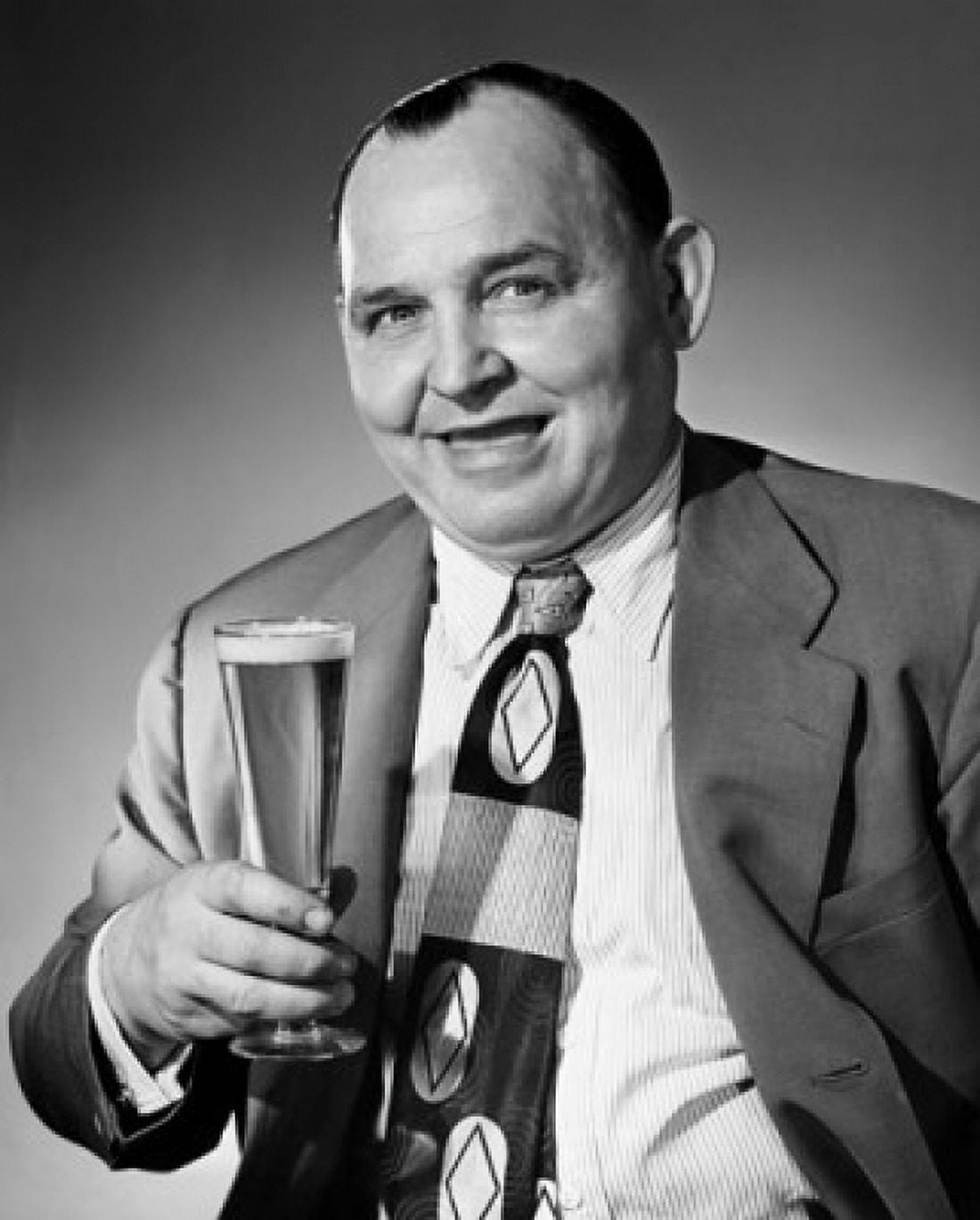 Portrait of a mature man holding a glass of beer Canvas Art - (24 x 36)