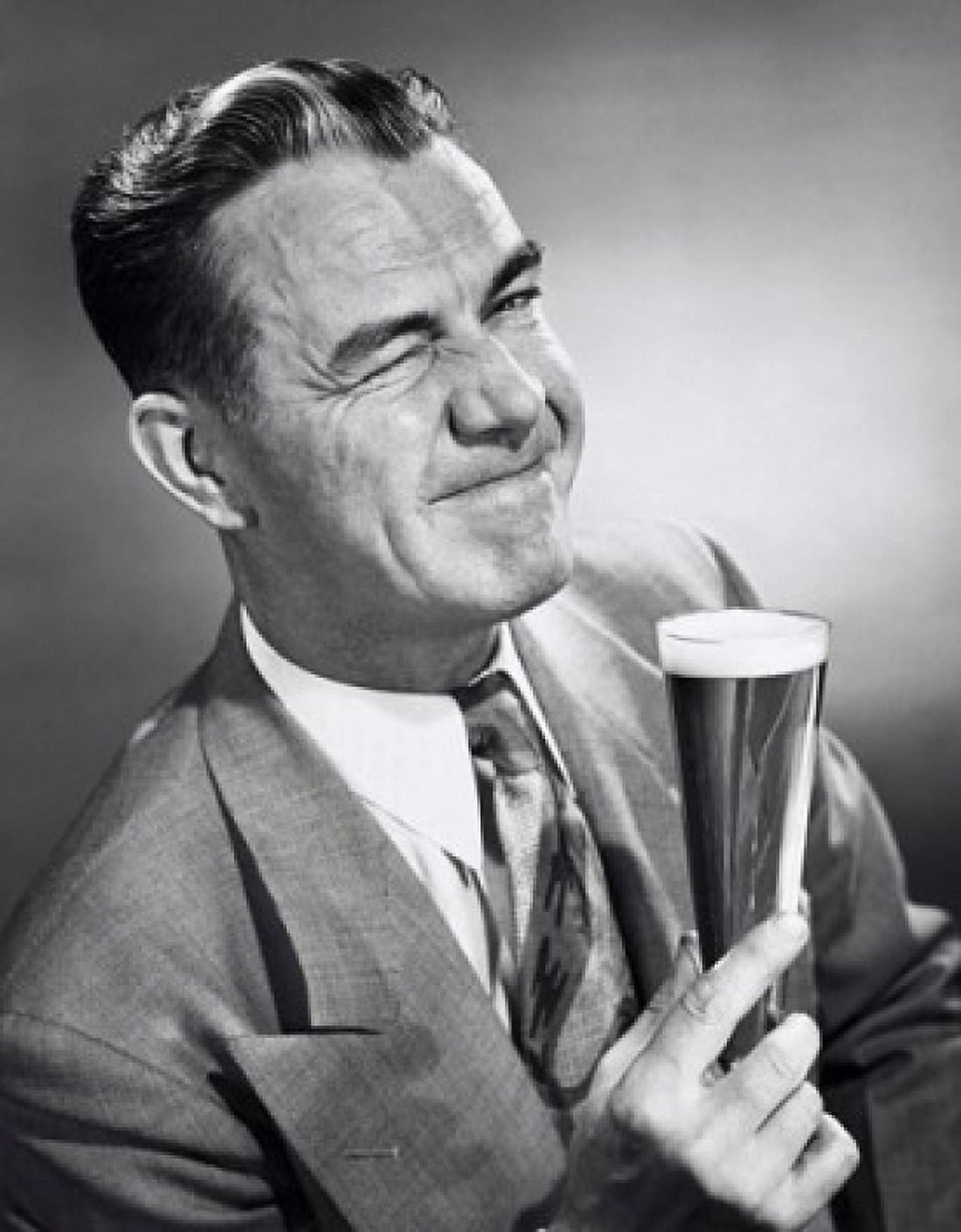 Portrait of a mature man holding a glass of beer Canvas Art - (24 x 36)