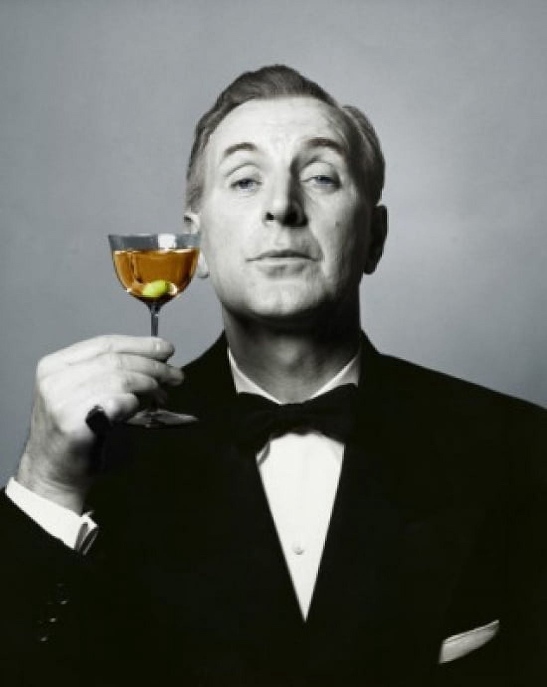 Portrait of a mature man holding a martini Canvas Art - (18 x 24)