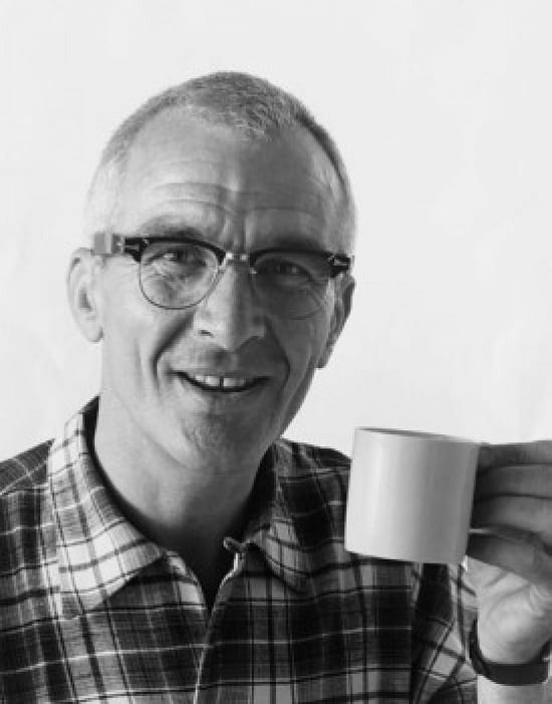 Portrait of a mature man holding a tea cup Canvas Art - (18 x 24)